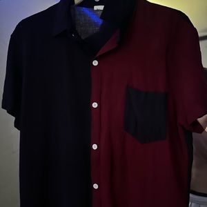 small, maroon and purple button up shirt.